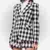 Emily Cooper's (Lily Collins) black and white checkered blazer from Emily in Paris