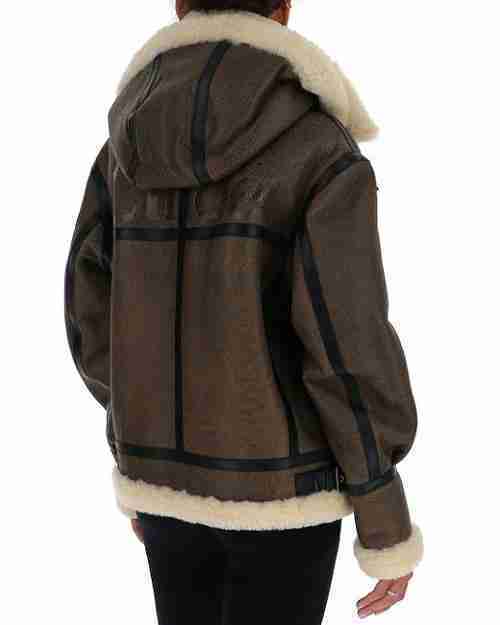 Rear of women's hooded brown aviator leather fur jacket