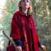 Kiernan Brennan Shipka as Sabrina Spellman in her iconic woolen red peacoat