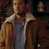 Evan Williams as Jack Russo wearing a brown suede shearling lined jacket in Midnight At The Magnolia