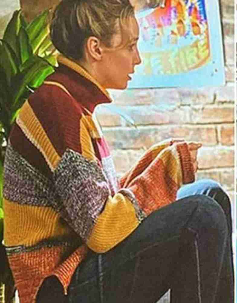 Jodie Comer (Molotov Girl) from the movie Free Guy wearing a striped sweater