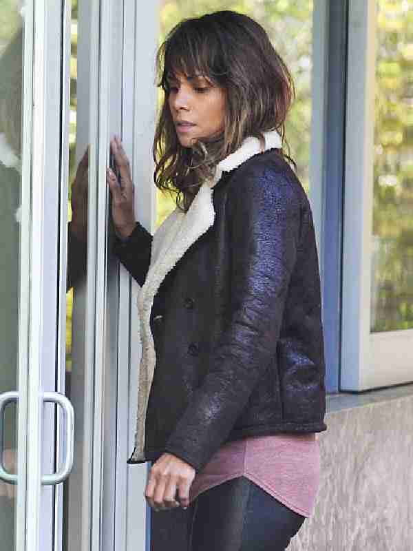 Halle Berry wearing a dark brown shearling lined jacket in Extant
