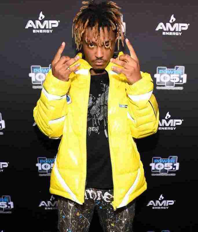 Juice Wrld at the AMP Energy event wearing a yellow puffer jacket