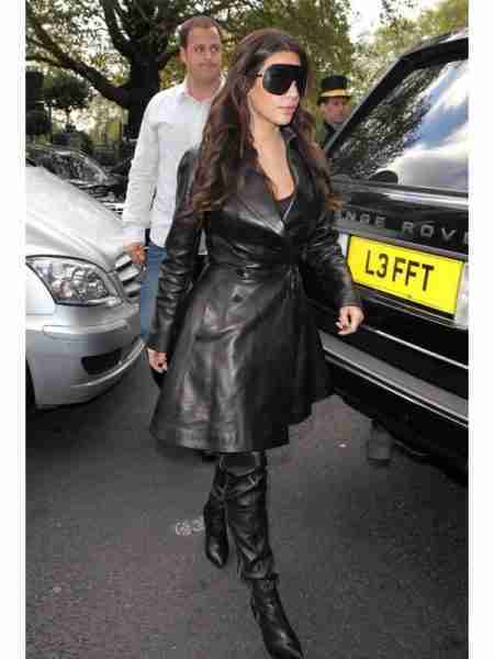 Kim Kardashian in her black leather trench coat