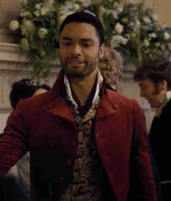 Regé-Jean Page (Simon Basset) wearing a red tailcoat featuring in Bridgerton