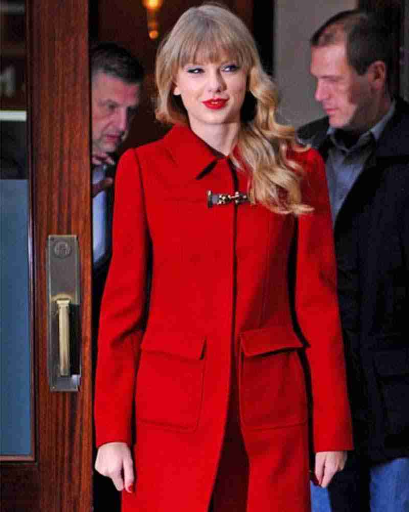 Taylor Swift wearing a mid-length woolen red coat during the Ruby Red Week event