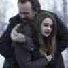 Joey King as Kayla wearing a black parka jacket in the movie The Lie