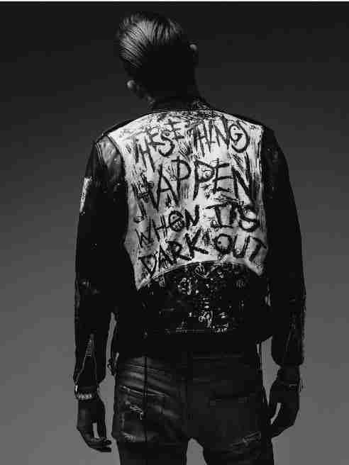 G-Eazy wearing the These Things Happen When It's Dark Out jacket in his music video
