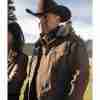 Kevin Costner as John Dutton in Yellowstone TV show wearing a brown corduroy jacket