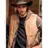 Luke Grimes wearing a light brown vest as Kayce Dutton in Yellowstone