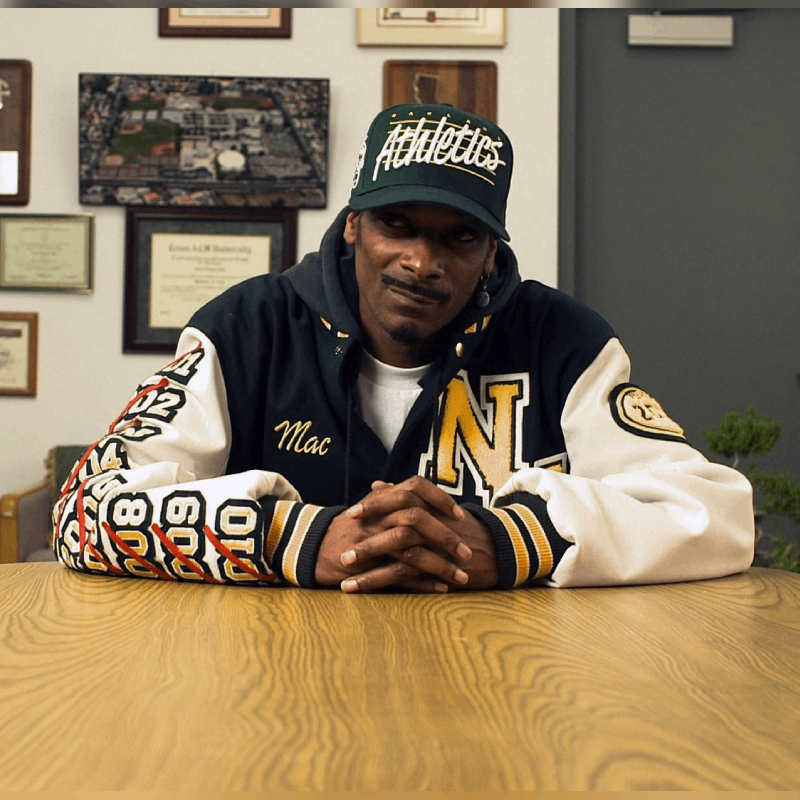 Snoop Dogg in Mac N Devin Go To Highschool wearing a N Hale High varsity jacket
