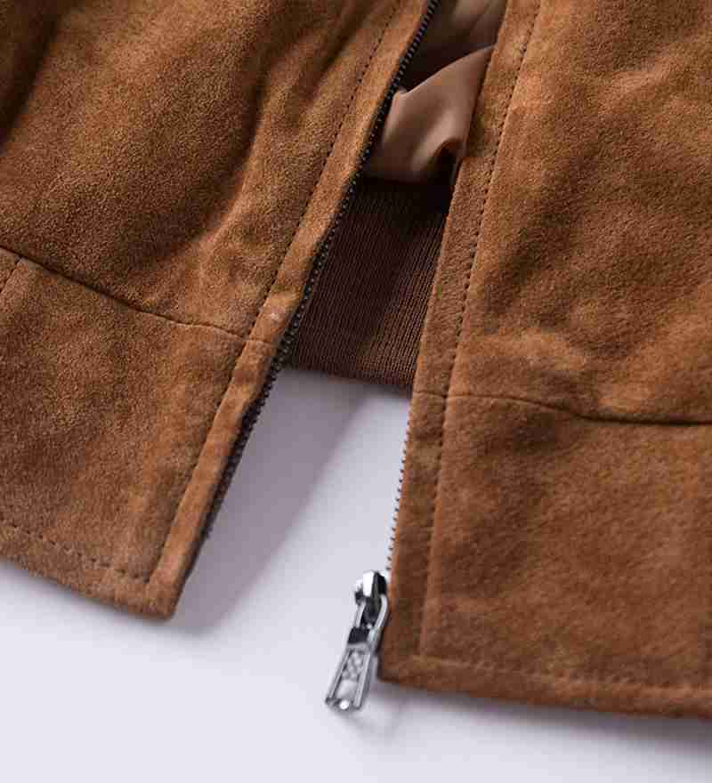 Front zippered closure of brown bomber suede jacket