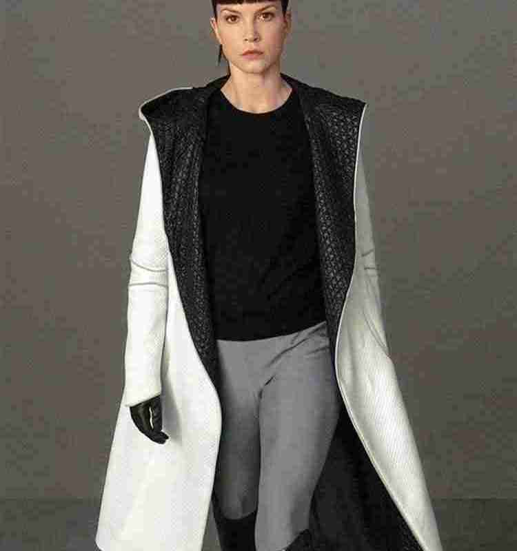 Sylvia Hoeks as Luv from Blade Runner 2049 movie wearing a white leather hooded coat