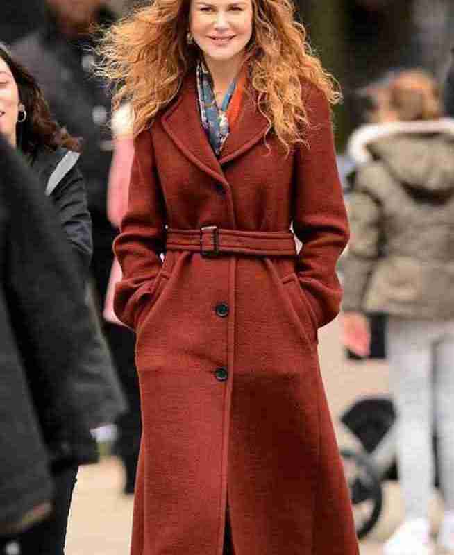 Nicole Kidman on the set of The Undoing wearing a maroon woolen longcoat