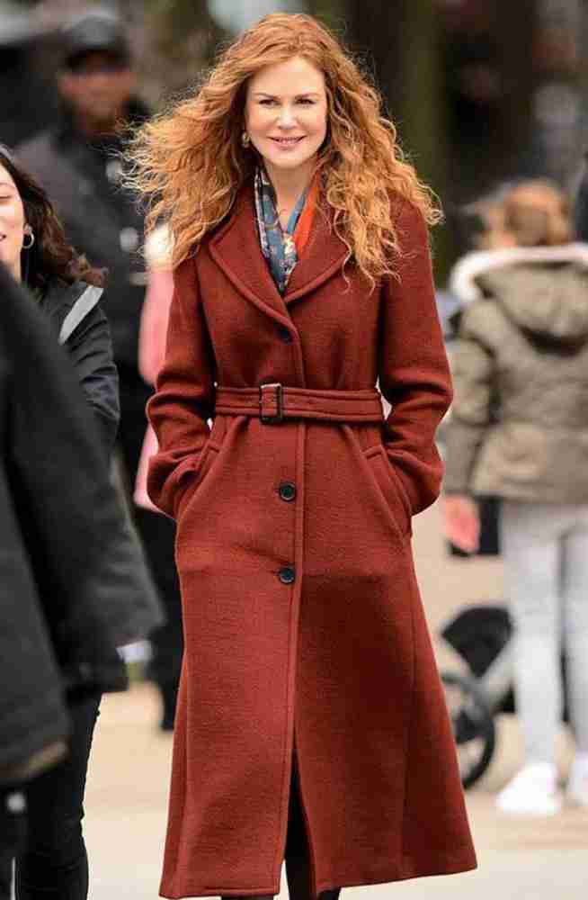 Nicole Kidman on the set of The Undoing wearing a maroon woolen longcoat