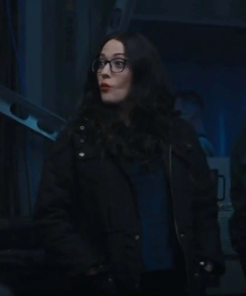 Darcy Lewis played by Kat Dennings in WandaVision wearing a black cotton jacket
