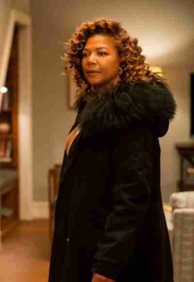 Queen Latifah as Robyn McCall in a black fur collar coat in The Equalizer 2021