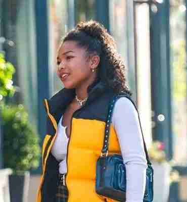 Laya DeLeon Hayes in a black and yellow puffer vest on the set of The Equalizer (2021)