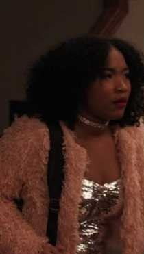 Laya DeLeon Hayes as Delilah in The Equalizer (2021) wearing a pink faux fur jacket