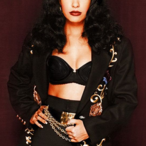 Selena Quintanilla black coat