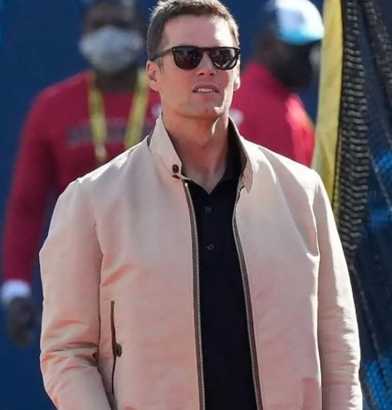 American Football Quarterback Tom Brady in a white jacket