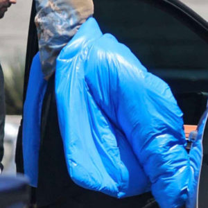 Kanye West wearing his Yeezy Gap blue round puffer jacket