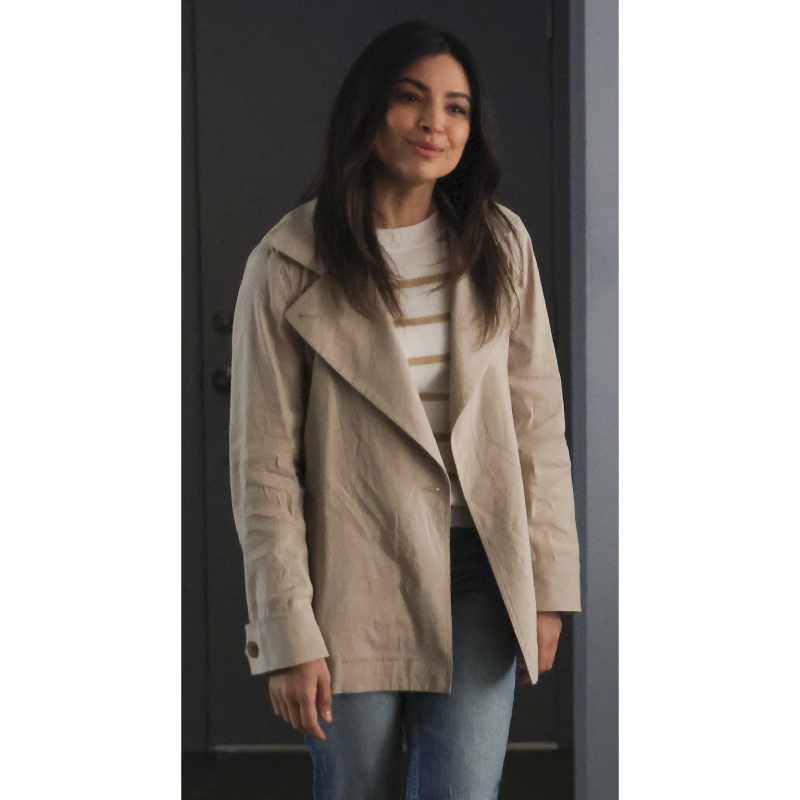 Floriana Lima as Darcy Cooper in A Million Little Things wearing an off-white coat