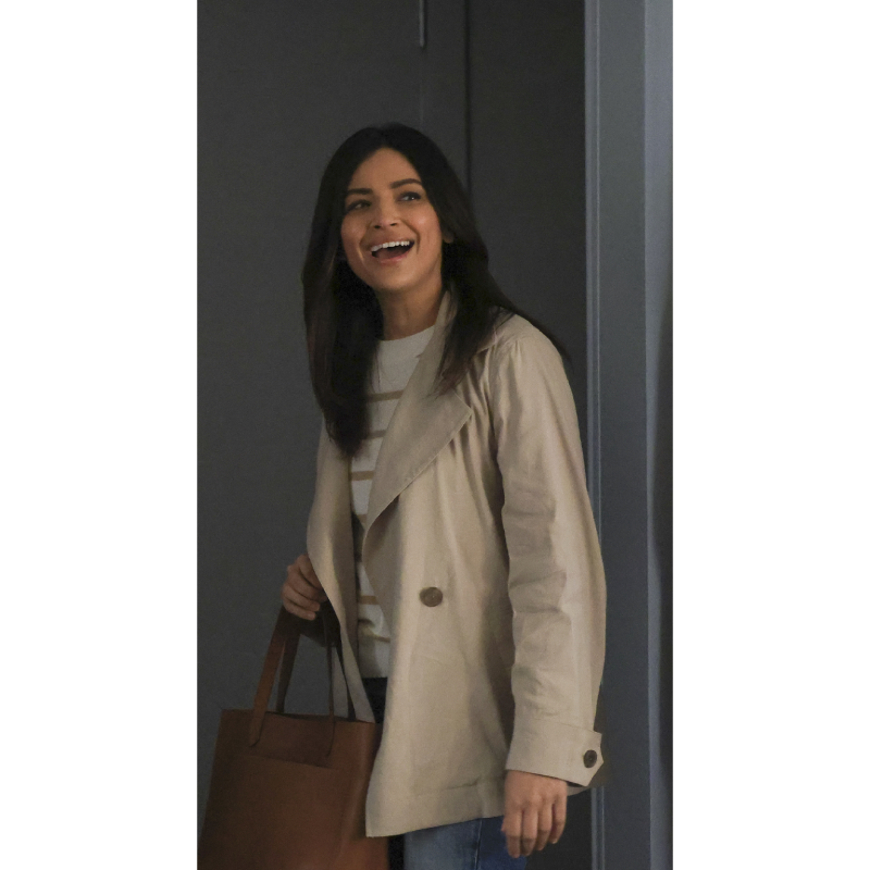 Floriana Lima wearing an off-white coat as Darcy Cooper in A Million Little Things
