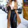Kendall Jenner wearing a long woolen brown trench coat