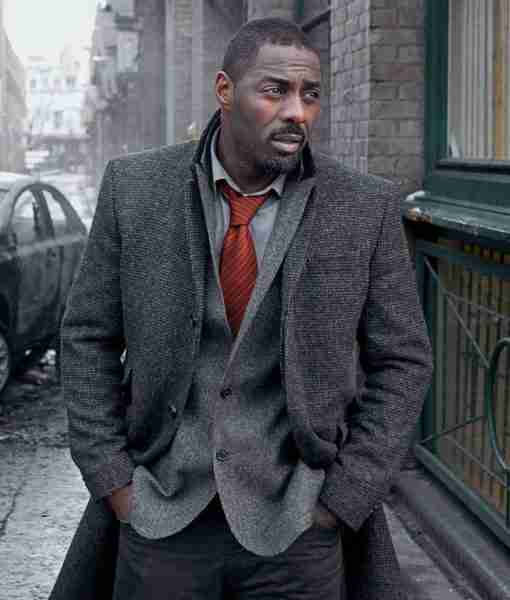 Idris Elba wearing a grey trench coat for the Luther TV series
