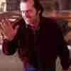 Jack Nicholson as Jack Torrance in The Shining movie wearing a red corduroy jacket