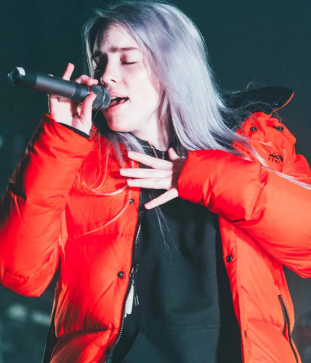 billie-eilish-orange-puffer-jacket-scaled